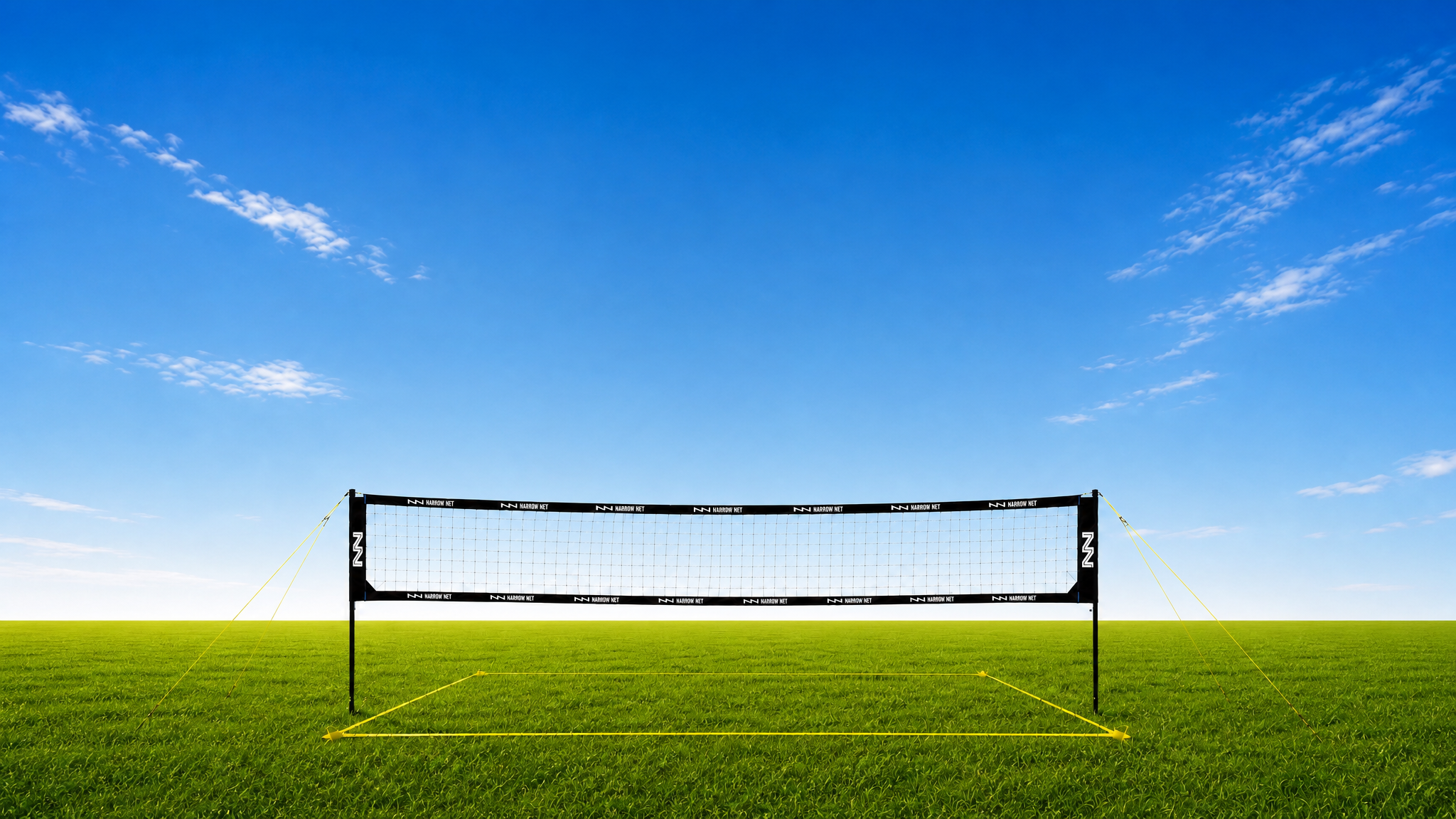 Narrow Net volleyball system set up on grass